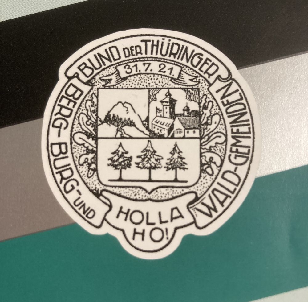 Logo des Bundes der Thüringer Berg-, Burg- und Waldgemeinden mit der Veste Wachsenburg als Vorort der Gründungsversammlung 1921